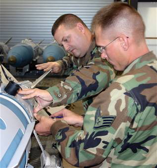 Airmen build JDAMs for first Raptor deployment