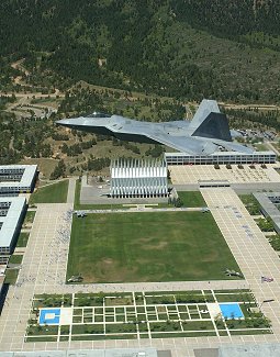 An Edwards F/A-22 Raptor flies for the first time over the U.S. Air Force Academy in Colorado Springs, Colo., Tuesday. This flight was flown by Lt. Col. Dawn Dunlop, F/A-22 test pilot and 1988 Academy graduate, in support of the Class of 2004's graduation parade.  (Photo by Kevin Robertson)