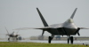 F-22A Raptors taxi down the runway